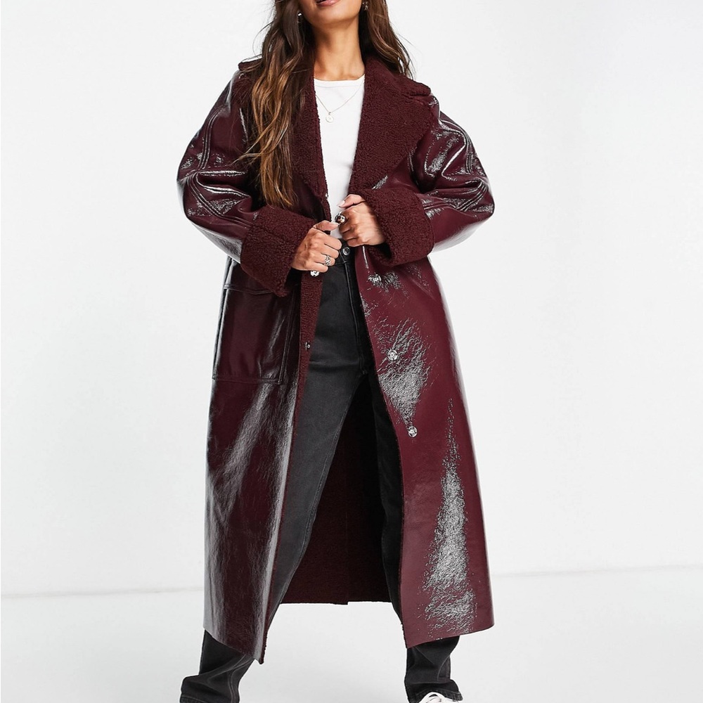 ASOS Topshop vinyl & sherpa long coat in burgundy